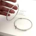 Silver hoops with clear rhinestones and cross charm detail for minimalist jewelry style - Silver Needle Cross Large Hoop (HE26550) / 5cm / Silver