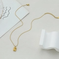 Collana dorata con ciondolo a forma di orsetto 3D geometrico e catena a sfere fine K18 - Oro