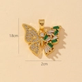 Macro shot of a 3D butterfly pendant with green and clear zircons, size 1.8cm by 2cm - C-Butterfly (1.8x2cm)