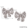 Orecchini a perno con fiocco in argento con zirconi a cuore e finitura in acciaio - Orecchini a Bottone Fiocco Argentato Zircone a Cuore