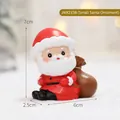 Mini statuetta di Babbo Natale con sacco regalo per decoro natalizio, 7x6x2,5 cm - Babbo Natale seduto
