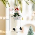 Decorazione natalizia pupazzo di neve in metallo con gambe a penzoloni, 12x5cm - Pupazzo di neve