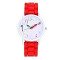 Close-up of red silicone strap watch with colorful pencil-shaped hands and digits - Red