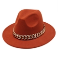 Detail of a rust orange wool fedora hat featuring a chunky gold chain embellishment - M (56-58cm) / Caramel color