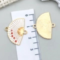 Ciondoli a ventaglio tradizionali in oro e smalto bianco con righello di misura - Bianco - Ventaglio Fiori di Pruno (24x19mm)