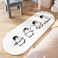 Oval white bedroom rug with cartoon penguin prints on a wooden floor, soft plush style - Hula Hoop Penguin