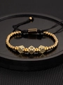 Classic gold crown bracelet with black zircon cubes and adjustable braided cord - Gold Dice Bracelet