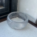 Macro shot of clear resin wide bangle with sparkling silver glitter on fabric background - Glitter Silver