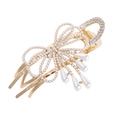 Goldene Blumen-Haarklammer mit Perlen und Kristallen im eleganten Schleifen-Design - Schleife mit Perlenquaste
