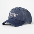 Detailed view of Baseball MOM embroidery on a vintage navy blue washed denim cap - Navy Blue