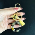 Handmade resin letter C keychain with real dried flowers and a golden bee charm - Letter C