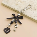 Detail of black ribbon bow keychain with silver skull key and heart cross pendant - Black Silver Skull Key Style (0206)