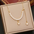 Elegant gold star zircon necklace with tassel pendants in a beige jewelry box - Double Pentagram Stars Pendant Style (3#)