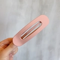 Pink matte large hollow oval hair clip for women, simple and seamless styling accessory - Korean Pink