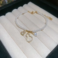French style pearl bracelet with golden gourd pendants and zircon details in jewelry box - Bracelet - Gold - White