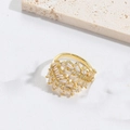 Detailed macro view of gold star moon ring with rectangular and round zirconia crystals - Leaf (Gold)