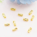 14K vergulde holle cilindrische kralen voor DIY sieraden maken op een roze achtergrond - Gesneden Kraal / 18K Goud