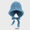 Winter light blue knit earflap hat with tie strings in a soft chunky knit style - M (54-58cm) / Light Blue