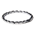 Polished dark grey hematite bead bracelet featuring a metallic sheen on a white background - 6mm Irregular Hematite
