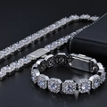 Macro shot of silver hip hop bracelet and necklace with sparkling zircon pavé stones - Necklace 24 Inch (Approx 60.96cm) / Width 12mm / Platinum