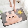 Plush bathroom mat with pink cartoon bunny and yellow stars on grey absorbent fabric - Star Rabbit