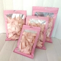 Pink resealable bags for disposable cotton towels with clear window and hanging hole - English Packaging / 20PCS