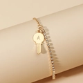 Double-layered gold bracelet with white zircon stones and an engraved 'A' key pendant - KC Gold Letter A Key Double Layer Style (DZ-473)