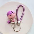 Handmade woven bell keychain in purple and pink tones with star cutouts and silver clip - Pink Purple
