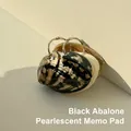Macro shot of black abalone pearlescent notepad with metallic loose-leaf ring - Black Abalone Pearlescent Memo Pad / Approx. 6-9cm