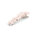 Close-up of natural pink crystal stone fragments wire-wrapped on a silver metal hair clip - Rose Quartz