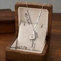 Silver titanium steel necklace with letter J pendant and tassel in a wooden jewelry box - Letter J / Silver