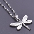 Minimalist silver dragonfly pendant necklace in stainless steel with a delicate metal chain - Necklace / Silver