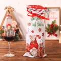 Christmas wine gift bag with gnome and gingerbread house print on linen texture - Gingerbread Man Gnomes Style