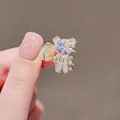 Cute golden bear hair claw with large pink crystal and white zircon accents - Purple Pink Crystal Bear