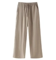 Detail of light khaki wide-leg pants with drawstring elastic waist and side pockets - Khaki Pants