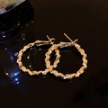 Detail of gold hoop earrings featuring a unique geometric block pattern and polished finish - Gold Geometric Spliced Circle (12# Silver Earring Post)