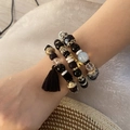 Detail of beaded bracelet with Eiffel Tower charm and black tassel on a model wrist - Black (6# Black)