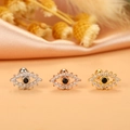 Macro shot of evil eye cartilage earrings in silver, rose gold, and gold plating - 3# Evil Eye