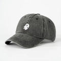 Detail of embroidered ghost pattern on grey washed denim baseball cap with vintage texture - One Size / Black