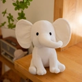 Cute white plush elephant toy in a soft sitting pose for baby nursery comfort - White With White Ear Core
