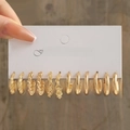 Close-up of 6-pair gold geometric earring set including textured and minimalist hoops - 6 Pairs Set - Style D / Gold