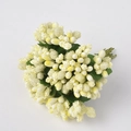 Detailed view of pale yellow artificial berry clusters with green fabric leaves for decor - Large Bag / Milk White