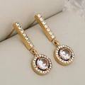 Golden double-layer round earring with sparkling white crystals and elegant long tassels - Gold Round