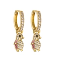 Detailed macro view of penguin hoop earrings with sparkling cubic zirconia in gold - Gold Rose Red Zircon Penguin