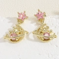 Macro shot of gold bear earrings with pink star zircons and saturn ring detail - Saturn Pink Zirconia Bear (ES2289)