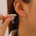 Vintage 3D frog stud earrings in silver finish worn by a model for a chic look - Antique Silver 1884