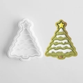 Christmas tree shaped cookie mold set with a finished green frosted cookie on white background - Christmas Tree B