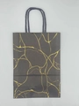 Elegant black kraft paper gift bag with golden marble pattern and black rope handles - Bronzing Marble / Black