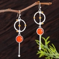 Vintage orange agate drop earrings in antique silver finish on natural wood background - Coral