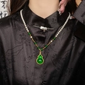 Detail of a natural pearl necklace with green hulu pendant and gold plated metal - 12# Necklace-White Pearl-Green Jade Gourd Pendant